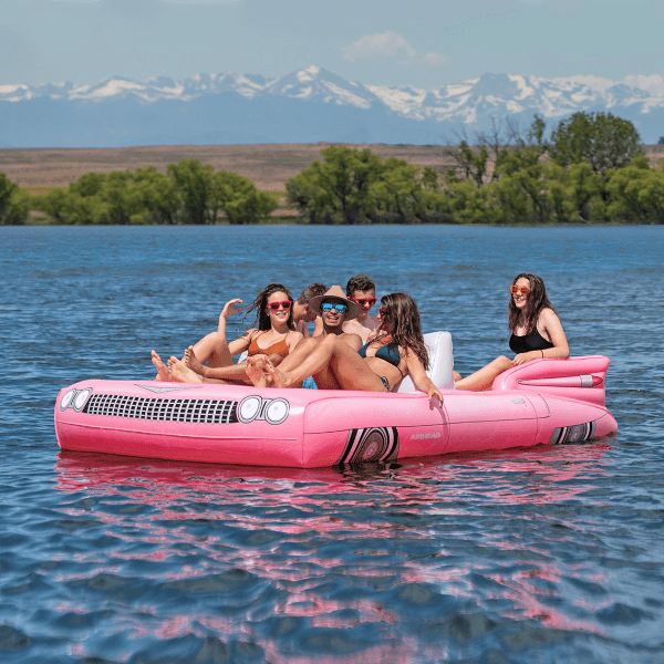 Classic Cruiser Action Shot of Adults in the Float on a lake
